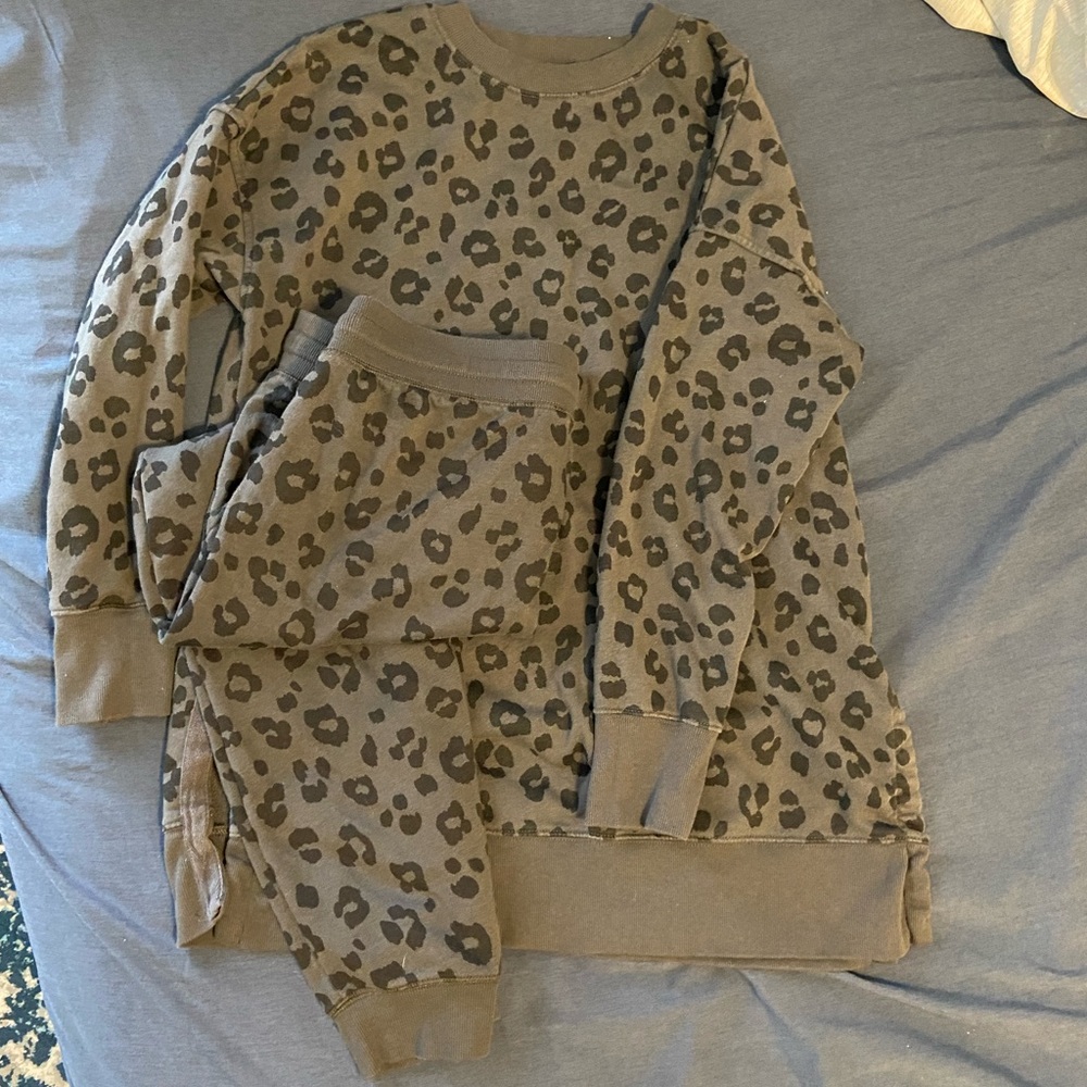 Grey and black cheetah sweat suit.